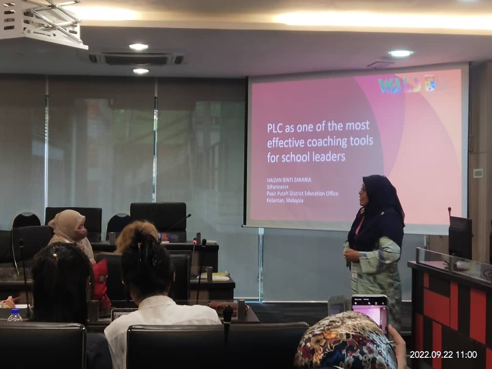 One of Brican English students presenting in conference